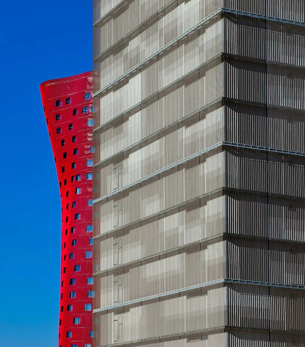 two gray and red buildings